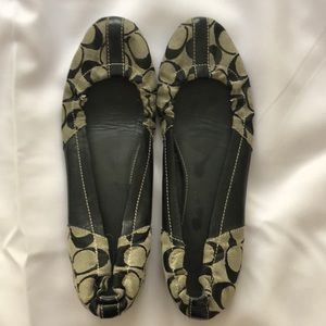 Black coach slip ons